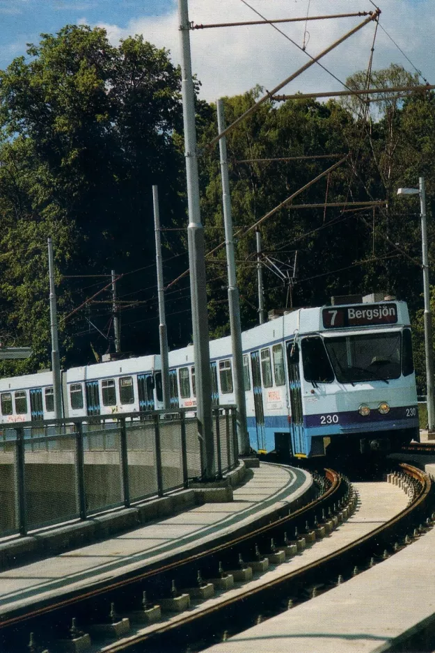 Postcard: Gothenburg tram line 7 with articulated tram 230 in the intersection Dag Hammarskjöldsleden (1989)