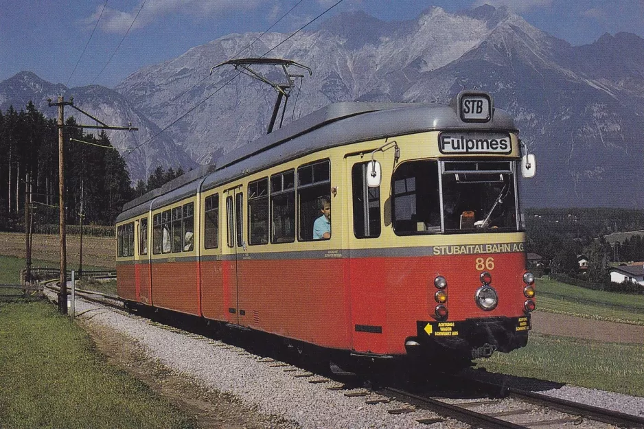 Postcard: Innsbruck Stubaitalbahn (STB) with articulated tram 86 at Muttereralmbahn (1986)