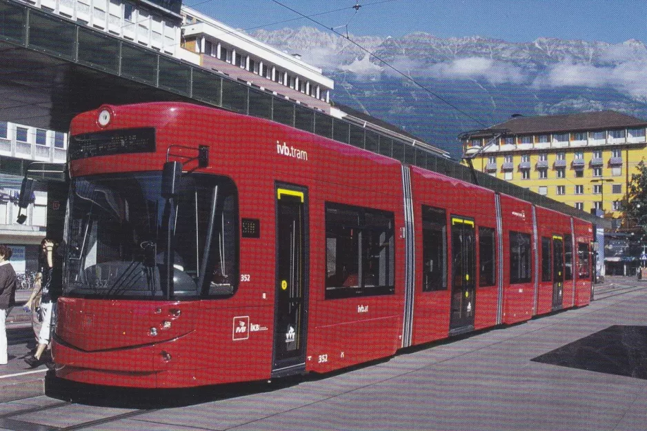 Postcard: Innsbruck Stubaitalbahn (STB) with low-floor articulated tram 352 at Hauptbahnhof, Südtiroler Platz (2009)