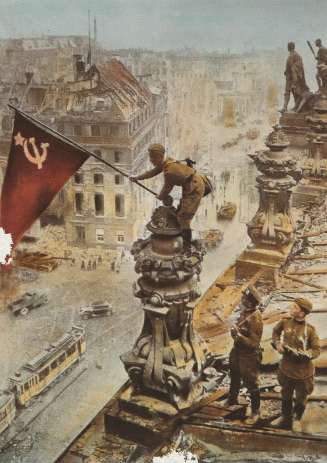 Postcard: Soviet soldiers raise the victory flag on the Reichstag in Berlin (1945)