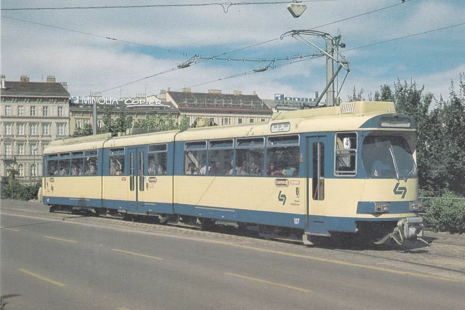 Postcard: Vienna regional line 515 - Badner Bahn with articulated tram 107 "Heri" on Karlsplatz (1984)