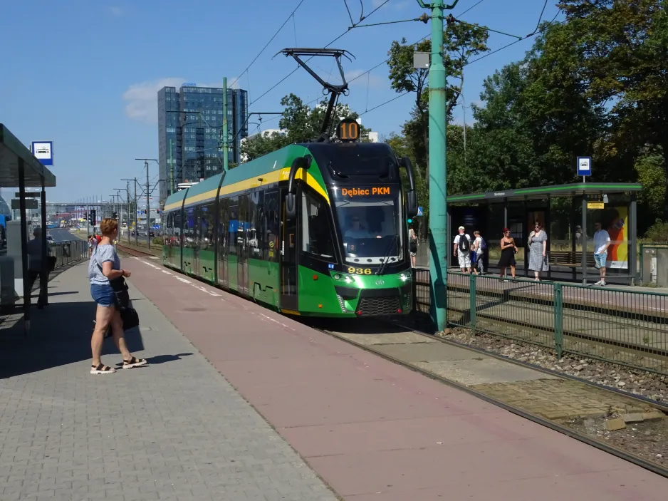 Poznań tram line 10 with low-floor articulated tram 936 at Wierzbięcice (2024)