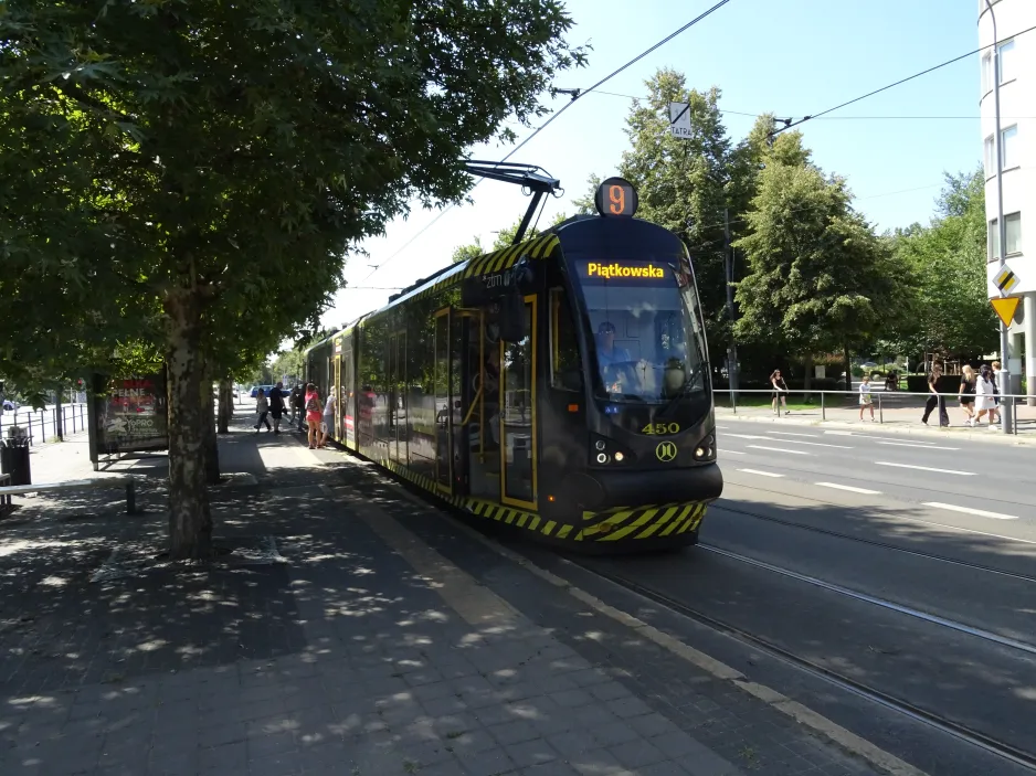 Poznań tram line 9 with low-floor articulated tram 450 at AWF (2024)