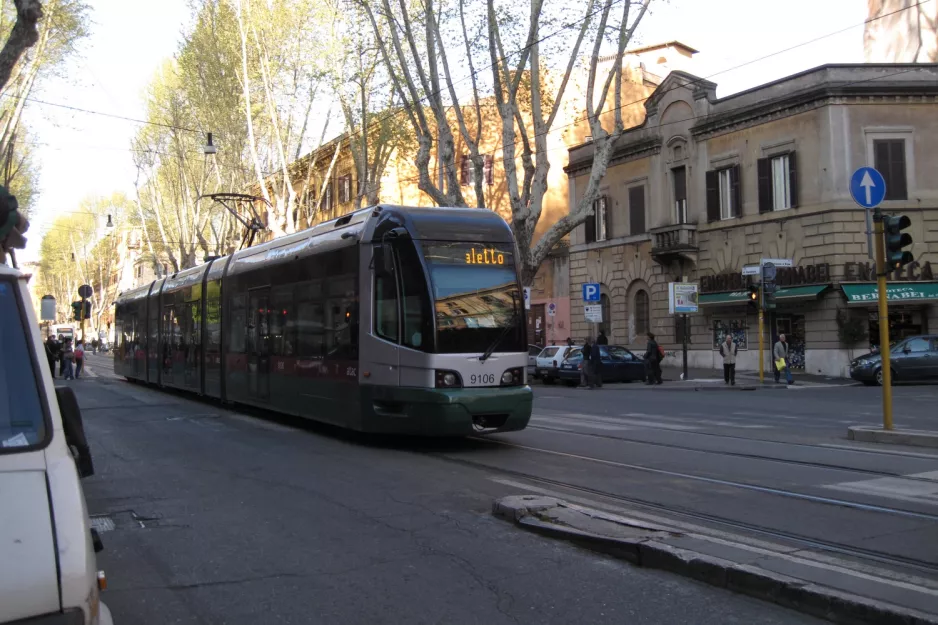 Rome tram line 8 with low-floor articulated tram 9106 close by Trastevere (2010)