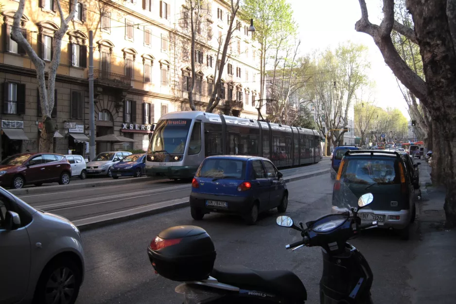 Rome tram line 8 with low-floor articulated tram 9204 on Trastevere / Min Istruzione (2010)