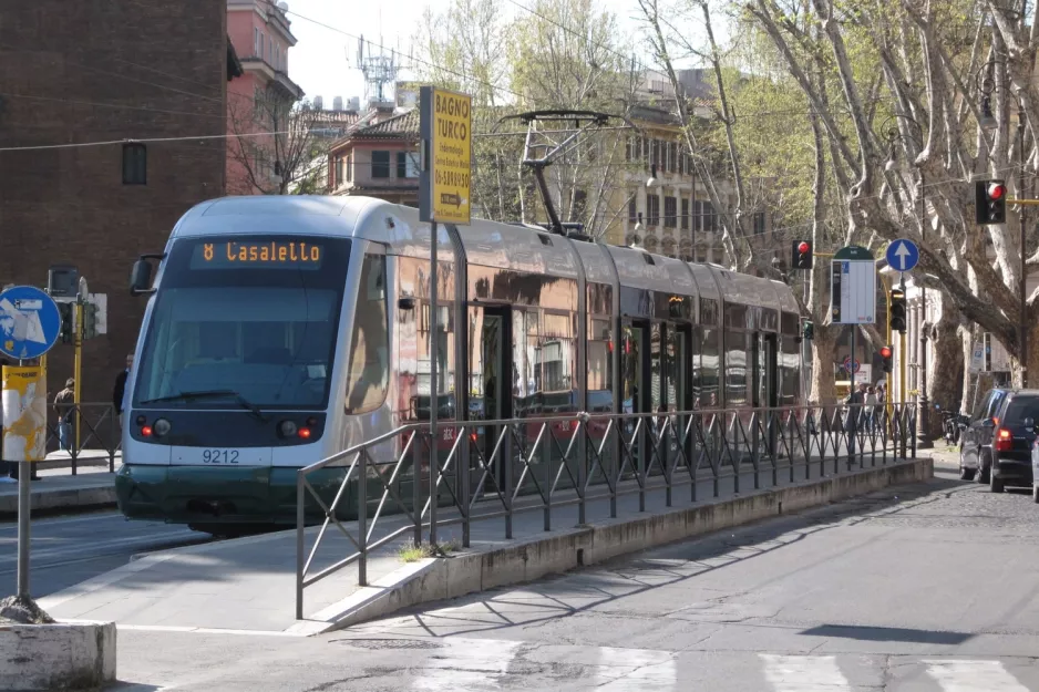 Rome tram line 8 with low-floor articulated tram 9212 on Trastevere/Min Istruzione (2010)