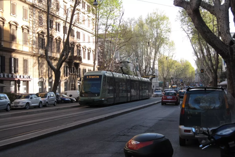 Rome tram line 8 with low-floor articulated tram 9250 close by Trastevere / Min Istruzione (2010)