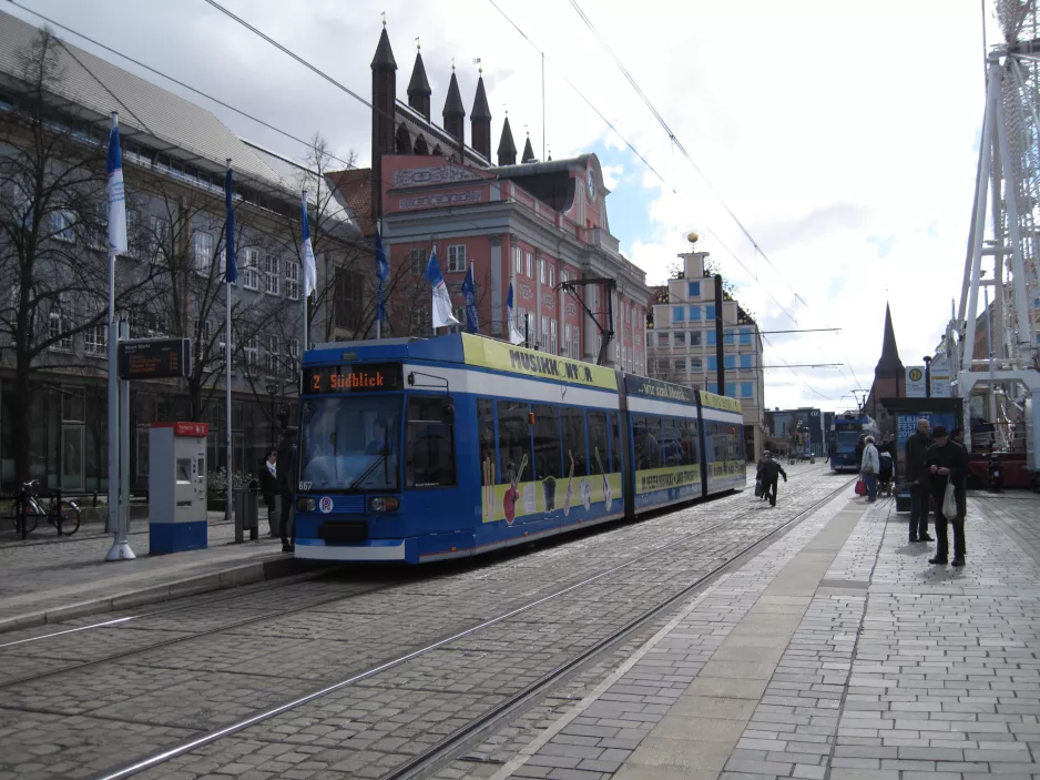 Rostock extra line 2 with low-floor articulated tram 667 at Neuer Markt (2015)