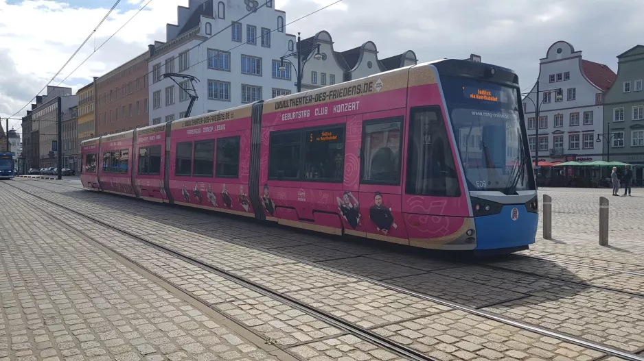 Rostock tram line 5 with low-floor articulated tram 609 on Neuer Markt (2022)
