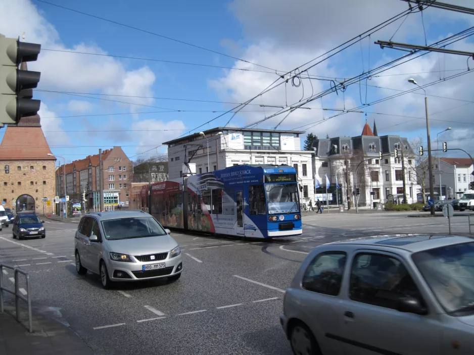 Rostock tram line 6 with low-floor articulated tram 672 near Steintor IHK (2015)