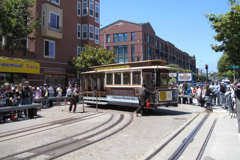 San Francisco cable car Powell-Mason with cable car 11 at Taylor & Bay  seen from the side (2010)