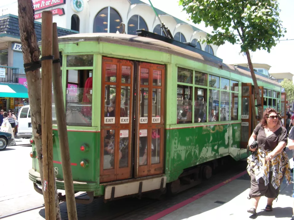 San Francisco E-Embarcadero Steetcar with railcar 1818 on Market Street (2009)