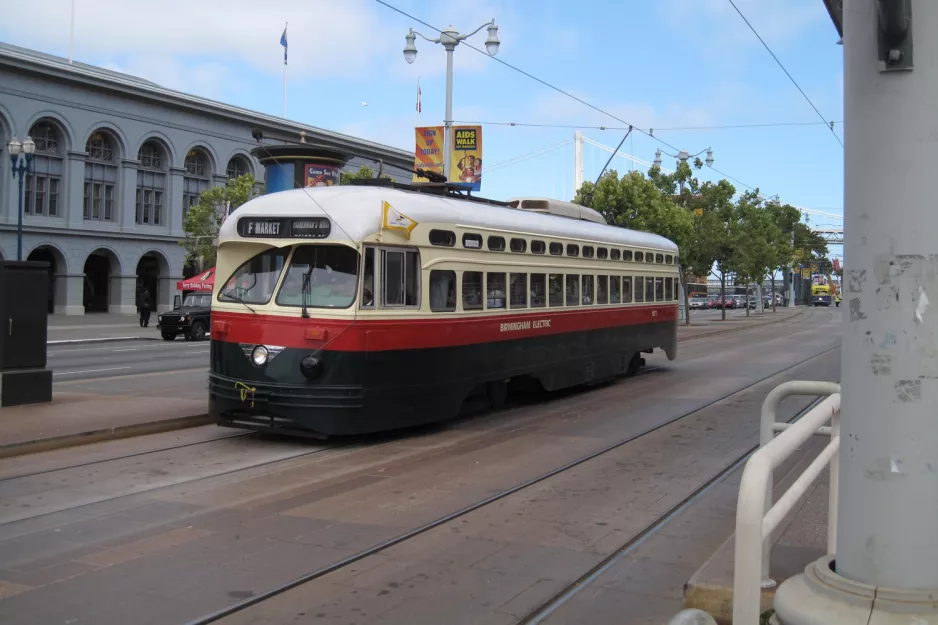 San Francisco F-Market & Wharves with railcar 1077 at Embarcadero & Ferry Building (2010)