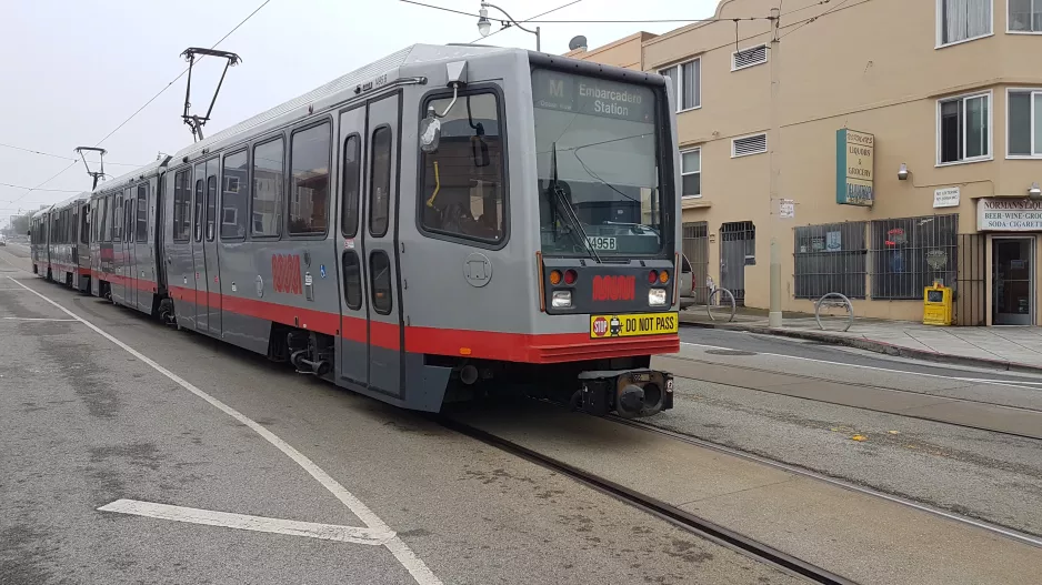 San Francisco tram line M Ocean View with articulated tram 1495 at 19th Ave & Randolph St (2019)