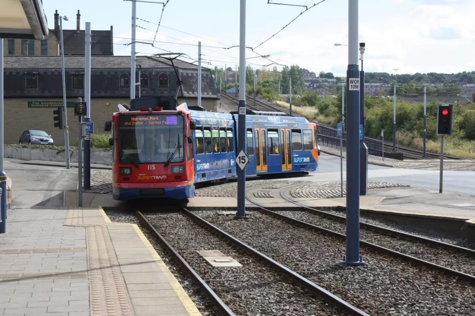 Sheffield Purple Route with low-floor articulated tram 115 at Woodbourn Rd (2011)