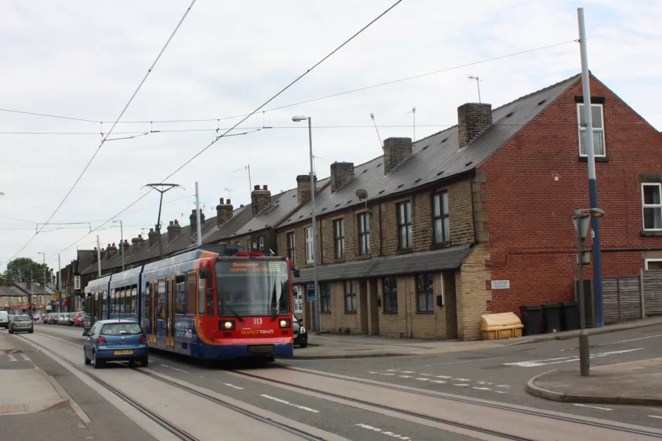 Sheffield tram line Yellow with low-floor articulated tram 113 on Middlewood Road (2011)