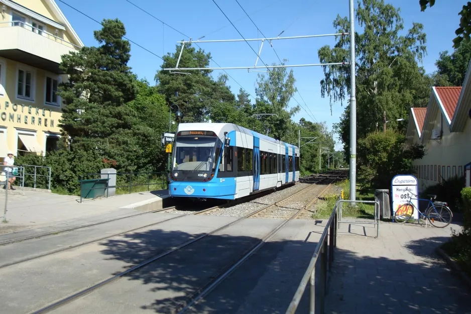 Stockholm tram line 12 Nockebybanan with low-floor articulated tram 430 at Nockeby torg (2009)