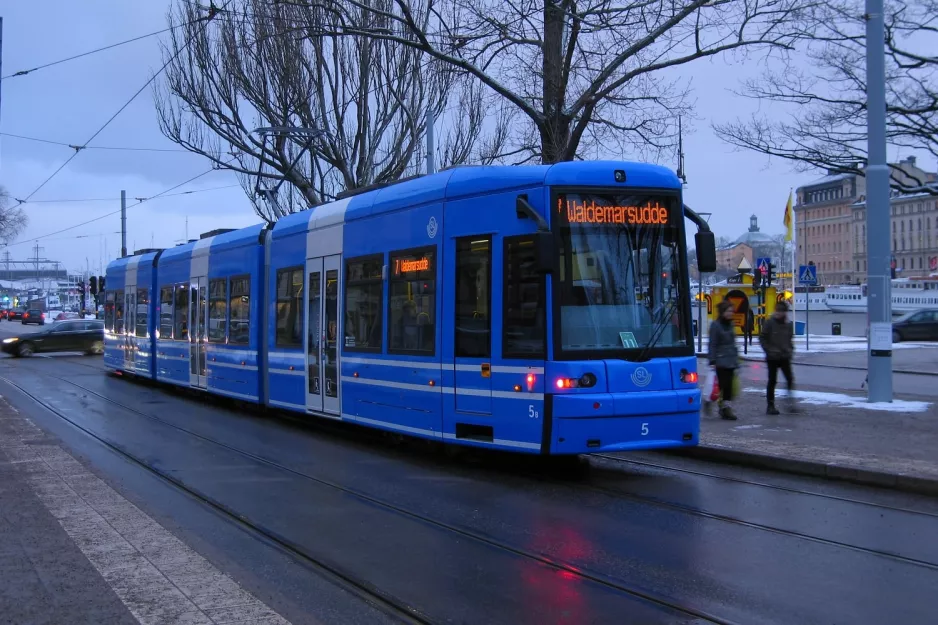 Stockholm tram line 7S Spårväg City with low-floor articulated tram 5 on Nybroplan (2012)