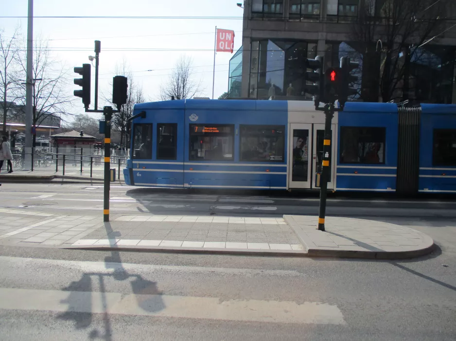 Stockholm tram line 7S Spårväg City with low-floor articulated tram 6 on Hamngaten (2019)