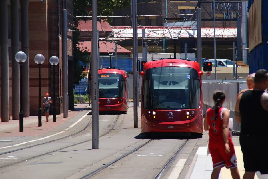 Sydney light rail line L1 with low-floor articulated tram 2112 on Darling Dr (2014)