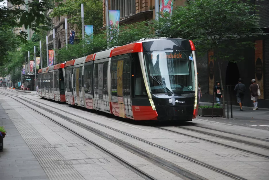 Sydney light rail line L2 with low-floor articulated tram 006 near Wynyard (2023)