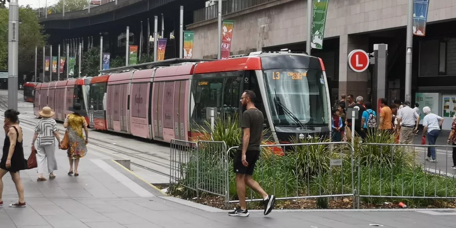 Sydney light rail line L3 with low-floor articulated tram 018 at Circular Quay (2023)