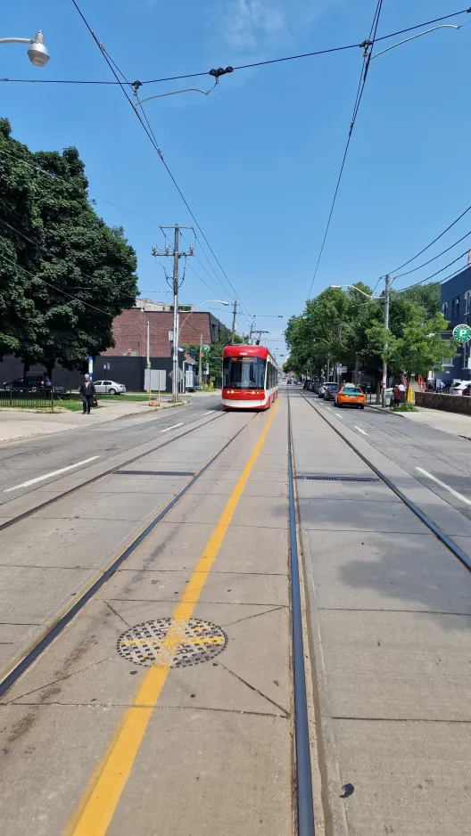 Toronto low-floor articulated tram 4423 near Queen St E at Broadview (2024)