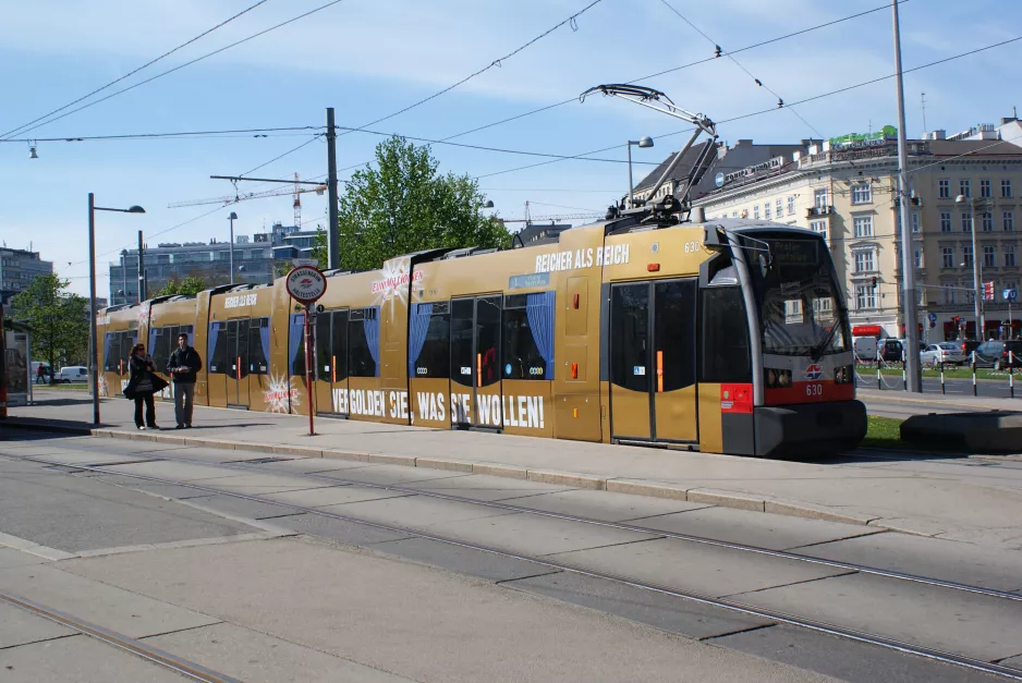 Vienna tram line 1 with low-floor articulated tram 630 at Karlsplatz (2012)