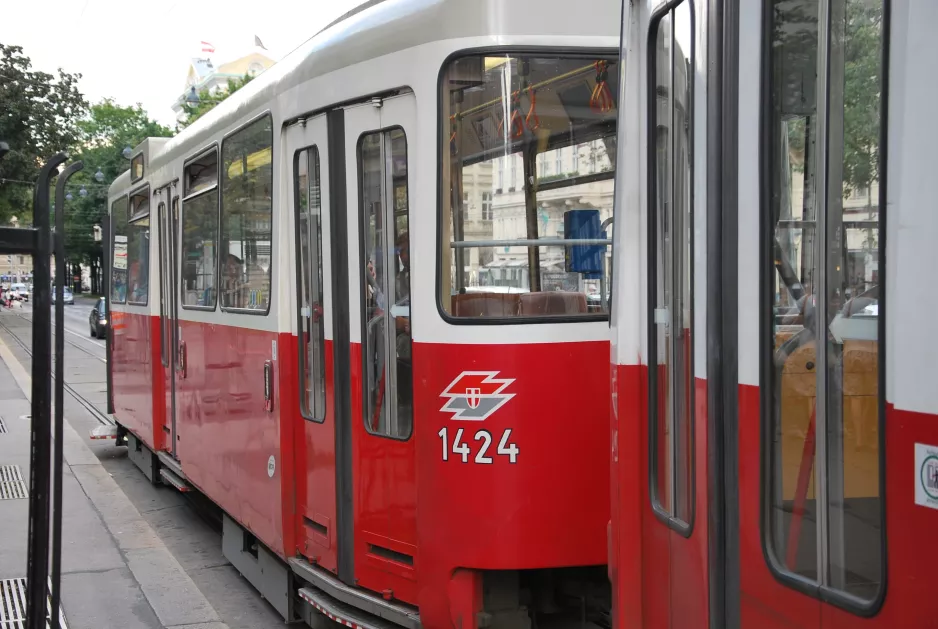 Vienna tram line 1 with sidecar 1424 on Opernring (2014)