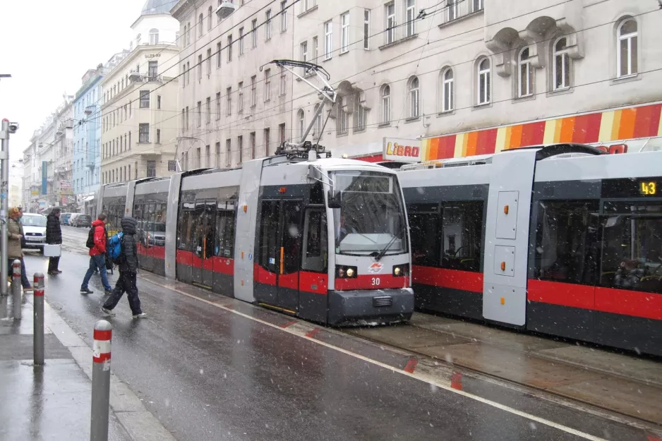 Vienna tram line 44 with low-floor articulated tram 30 at Skodagasse (2013)