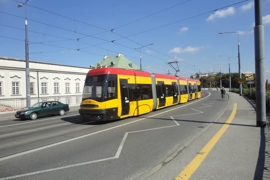 Warsaw tram line 26 with low-floor articulated tram 3178 on aleja Solidarności (2012)