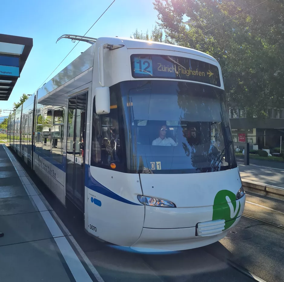 Zürich regional line 12 with low-floor articulated tram 3070 at Lindberghplatz front view (2020)